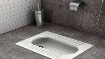 خلاقیت خنده دار پدر ایرانی در تبدیل توالت ابرانی به فرنگی حماسه ساز شد/ عکس