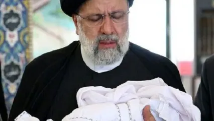 «حی علی فلاح» در هنگام اذان گفتن رئیسی در گوش نوزاد، حذف شد!/ ویدئو