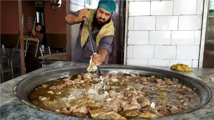 (ویدئو) غذای خیابانی محبوب در پاکستان؛ پخت 210 کیلو قابلی پلو با گوشت