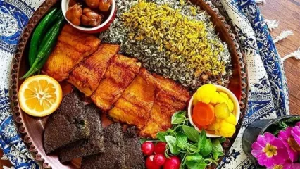 میدونی فلسفه غذاهای شب عید چیه؟ سبزی پلو با ماهی رکورددار سفره‌ ایرانیان!