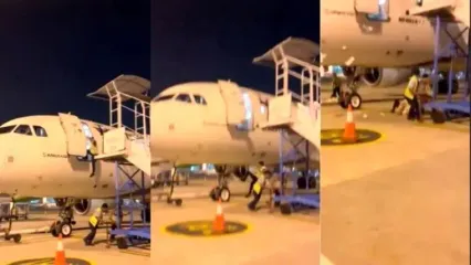 سقوط عجیب مهماندار از داخل کابین هواپیما!+ فیلم