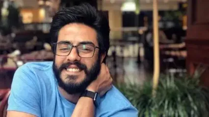 زندگی فوق‌العاده پوریا شکیبایی و همسرش؛ از نقاشی دیواری چارلی چاپلین تا کتابخانه‌ای خارق‌العاده!