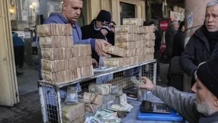 عراق: آمریکا با ادامه ارسال محموله‌های دلار موافقت کرد