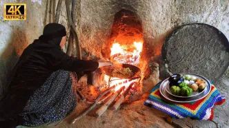 (ویدئو) طبخ یک غذا با گوشت و بادمجان به شیوه جالب مادربزرگ روستایی بختیاری