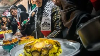 پویش قابلمه برگردان برای سرنگونی اسرائیل مقابل دانشگاه تهران/ تصویر