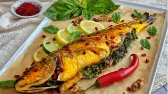 (ویدئو) طرز تهیه ماهی شکم‌ پُر اصیل شمالی برای شب عید