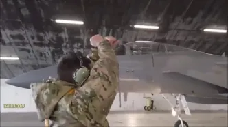 (ویدئو) فرآیند انتقال خلبان از قرارگاه به آشیانه و تیک آف جنگنده اف 15 در ایسلند