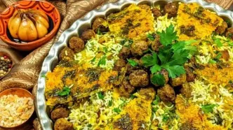 طرز تهیه کلم پلو شیرازی اصیل مجلسی+فیلم / نکات و فوت‌وفن های این غذای مجلسی را از دست ندهید