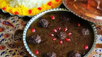 فسنجون با بادام زمینی: طعمی جدید و متفاوت از یک غذای سنتی + طرز تهیه