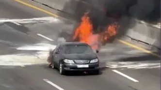 آتش گرفتن خودروی ماکسیما در بزرگراه آزادگان غرب