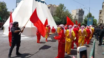 گزارش تصویری از آئین خیمه سوزان ظهر عاشورا در بازار تهران