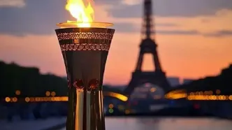ببینید | حمل مشعل المپیک از بالای ساختمان‌های پاریس
