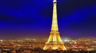 ببینید | نور افشانی برج ایفل با ورود کاروان فرانسه به محل رود سن