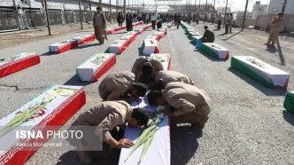 (تصاویر) پیکر ۹۸ شهید دفاع مقدس از مرز شلمچه وارد کشور شد