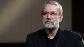 حضور علی لاریجانی در مراسم تدفین شهید حاجی‌زاده +عکس