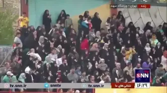 زن و مرد کنار هم تماشاگر فوتبال مداحان و رسانه ورزش