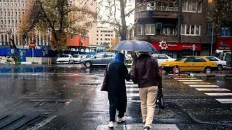 آسمان ابری و بارش باران در راه تهران