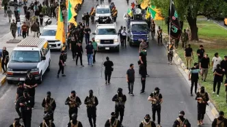 ادعای رویترز: تعدادی از گروه‌های شبه‌نظامی عراق آماده خلع سلاح شده‌اند