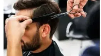 این آرایشگر عجیب موی سر را با آتش اصلاح می کند!/ عکس