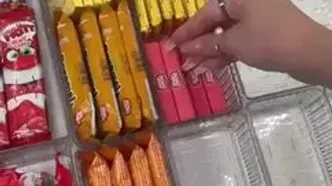 مرتب کردن کشو با کلی شکلات! + فیلم
