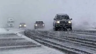 بارش دیدنیِ برف بهاری در جاده طرقبه