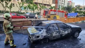 جزئیات جدید از آتش‌سوزی پژو ۴۰۵ در بزرگراه مدرس تهران/  2 نفر مصدوم شدند + عکس
