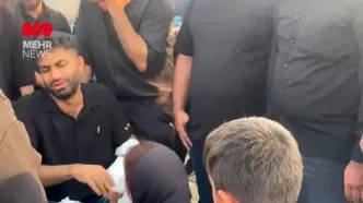 ببینید| لحظات غم انگیز تشییع پیکر یکی از جان‌باختگان انفجار بندرعباس؛ همسر سمیه رئیسی: زیر آتش سوخت