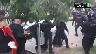 فیلم باورنکردنی از درگیری های هواداران بارسا و اسپانیول! / یک زن با ماشین از روی هواداران رد شد!