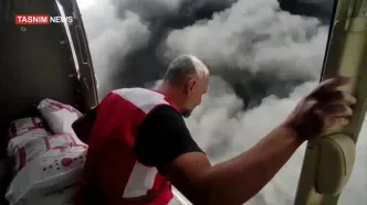 لحظه دلهره آور انفجار زیر بالگرد هلال احمر هنگام عملیات اطفاء حریق در بندر رجایى/فیلم