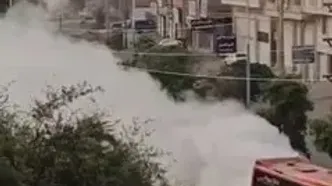 فیلم تردد اتوبوس مسافری با پلاک تهران در خیابان های مسجد سلیمان