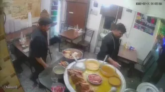 فیلم دزدی کله پاچه با روش موبایل قاپی ! / همه در مغازه حیرت زده شدند !