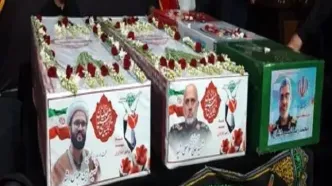 تشییع سپهبد شهید غلامعلی رشید و فرزندش و سردار نصیر باغبان بر دستان خوزستانی‌ها