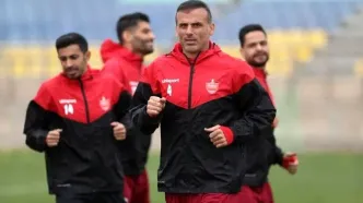 سیدجلال حسینی سرمربی پرسپولیس ؛ کریم باقری دستیار؛ تمام