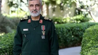 فرزند شهید حاجی‌زاده در آغوش مخبر