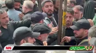 حضور سردار قاآنی و همسرش در مراسم تشییع پیکر شهیدان باقری و حاجی‌زاده