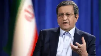 همتی: قیمت دلار سقوط می‌کند