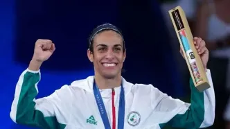 بوکسور زن جنجالی مرد از آب درآمد!