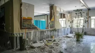مادر و فرزندی که در بمباران زندان اوین شهید شدند