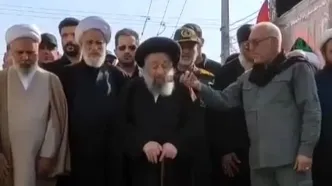اقامه نماز بر پیکر شهید غلامعلی رشید و فرزندش