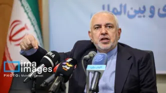 عکس: حضور ظریف در تشییع پیکر شهدای وطن