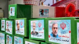 عروج خانوادگی/ تابوت شهید سردار باقری به همراه همسر و دخترش