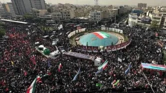 تصاویر جدید از مراسم تشییع پیکر شهدای جنگ در تهران + فیلم