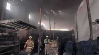 آتش‌سوزی یک کارگاه انبار پارچه در جاده ورامین