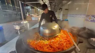 ببینید؛ غذای خیابانی در ازبکستان؛ پخت 400 کیلو سمرقند پلو با گوشت در تاشکند