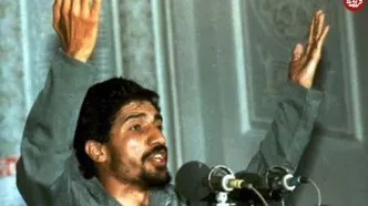 تصویری قدیمی از صادق آهنگران در کنار سردار سلیمانی