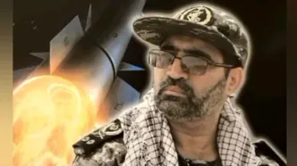 شهید سردار محمود باقری در حال هُل دادن چرخ هیئت