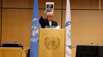 تصویر رایان ۲ ماهه در دست قالیباف در اجلاس ژنو