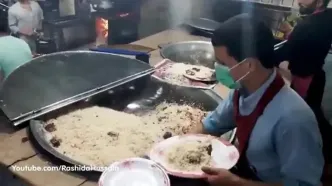 ببینید؛ غذای خیابانی در پاکستان؛ برش هندوانه، تهیه آبمیوه و پخت کباب در کراچی
