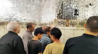 حضور ظریف بر مزار شهید رییسی