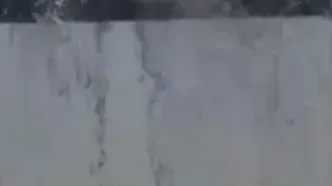 تصاویری از ترکیدگی لوله آب در‌ بزرگراه امام رضا